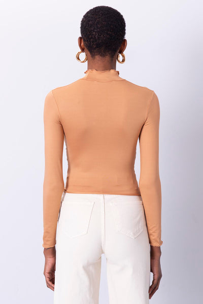 turtleneck draped body women camel back
